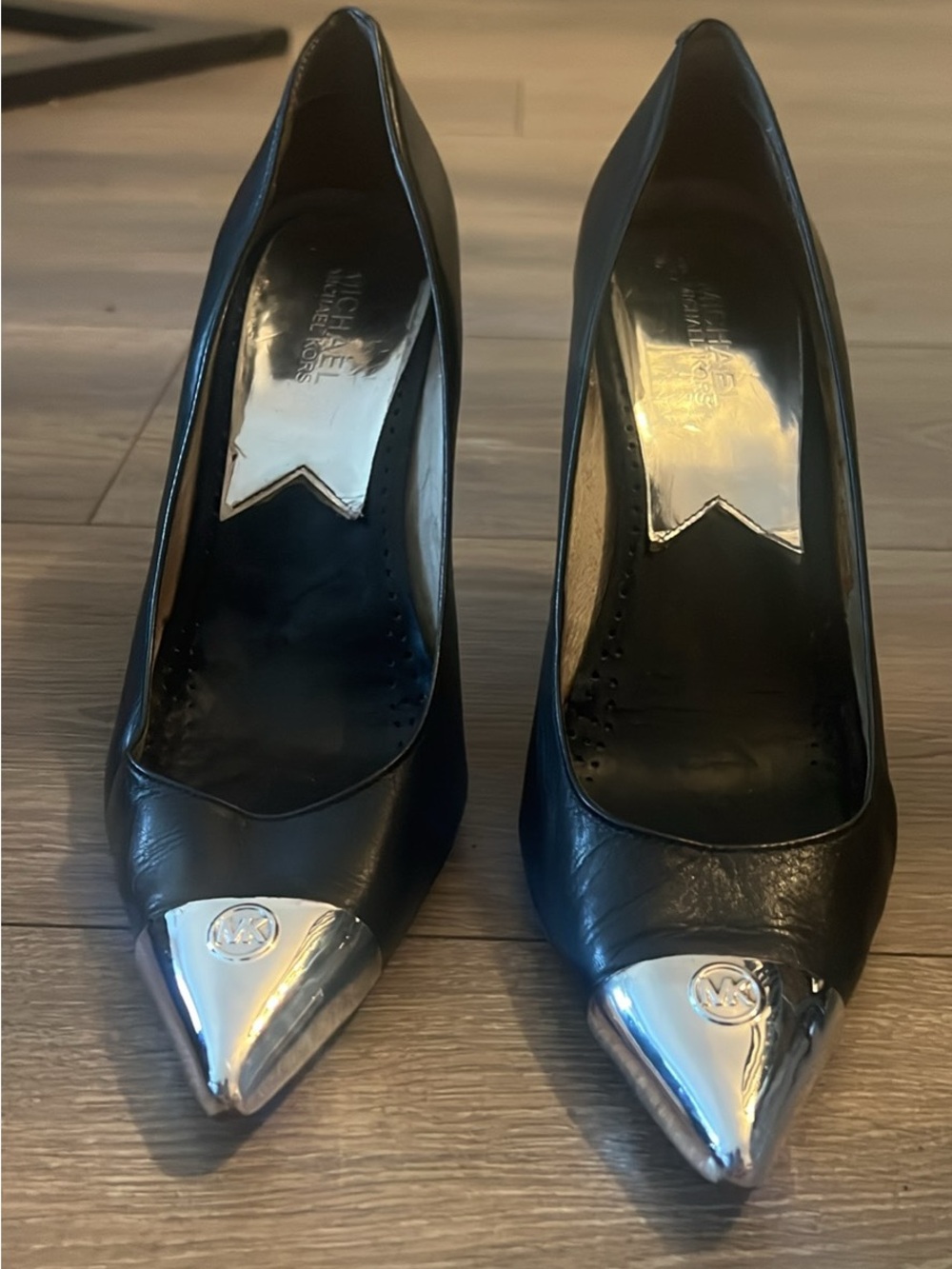 Michael Kors Black Leather Pointed-Toe Pumps with Silver Cap Toe MK Emblem